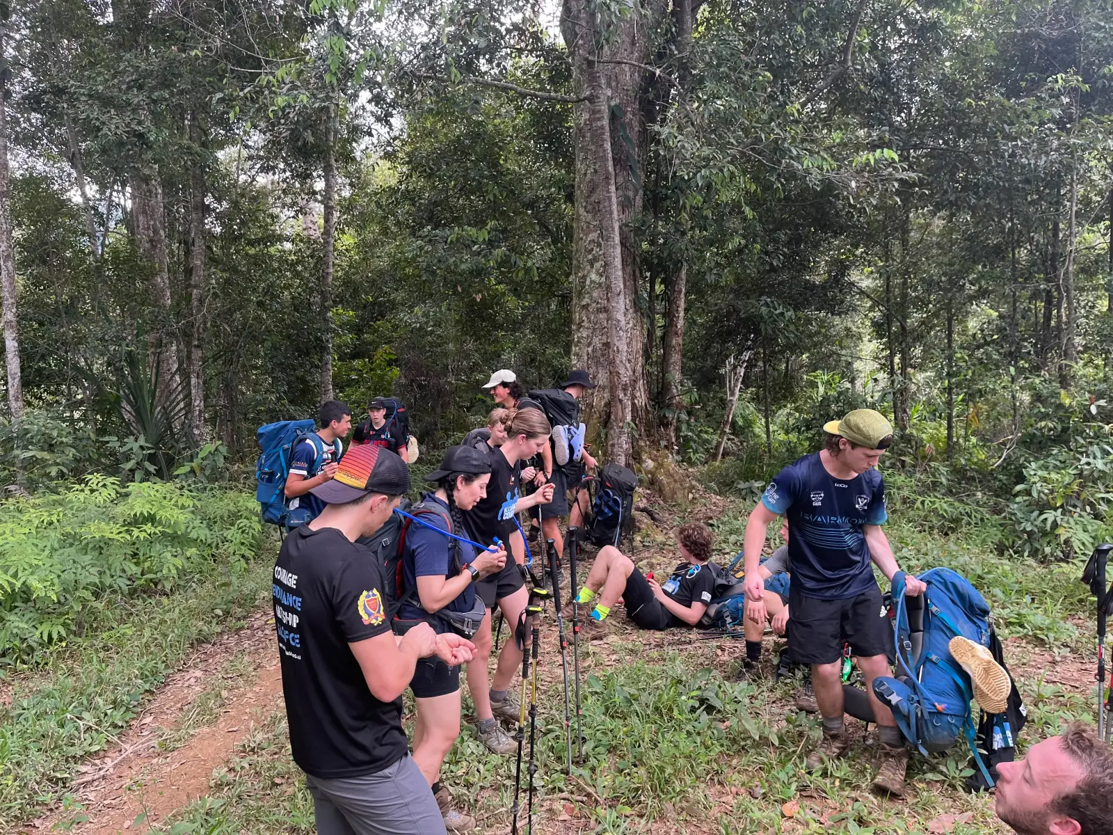 Family group trekking the Kokoda Track