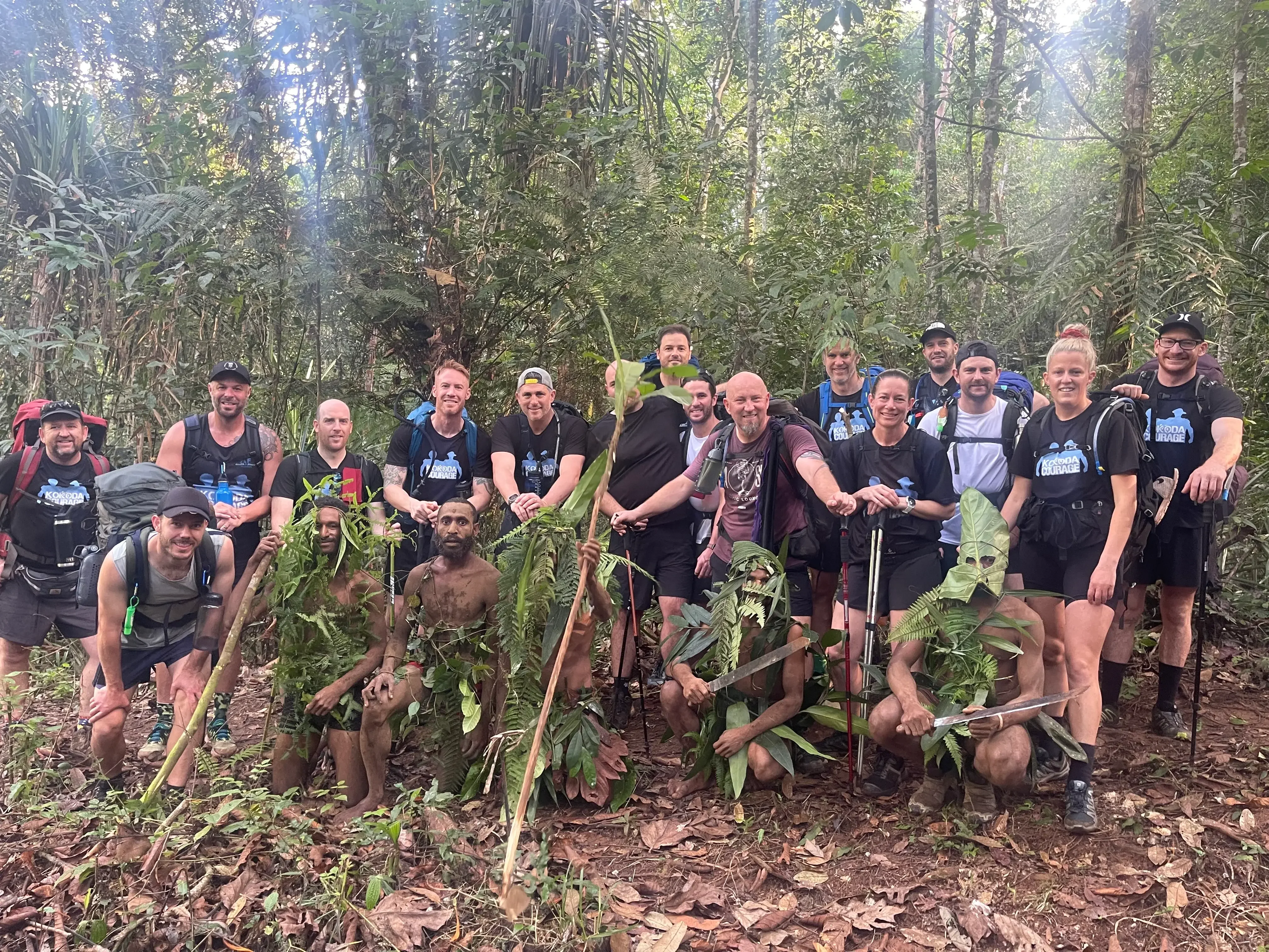 Kokoda Courage trekking group with local guides in the Owen Stanley Range